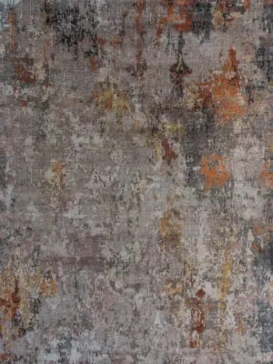 Autumn Whisper Rug featuring an abstract design with a mix of brown, beige, and rust tones, creating a warm, textured look. The colours blend irregularly
