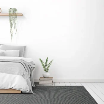 Amalfi Ambience Rug dark grey loop pile custom size rug in a bedroom