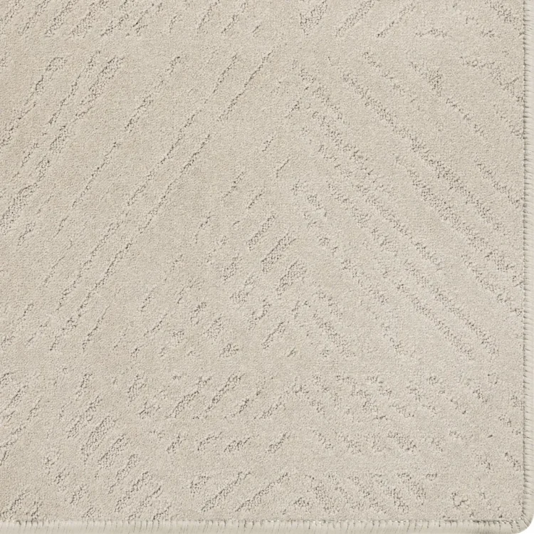 Dove cream carpet rug with scale pattern and overlocked edges