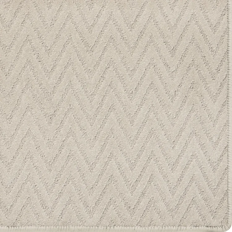 custom size cream colour rug with chevron pattern and overlocked edges