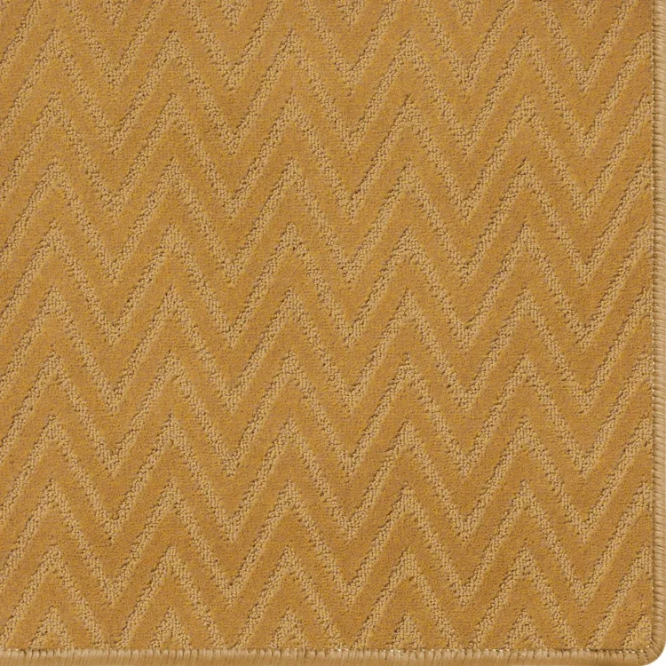 custom size orange bronze colour rug with chevron pattern and overlocked edges