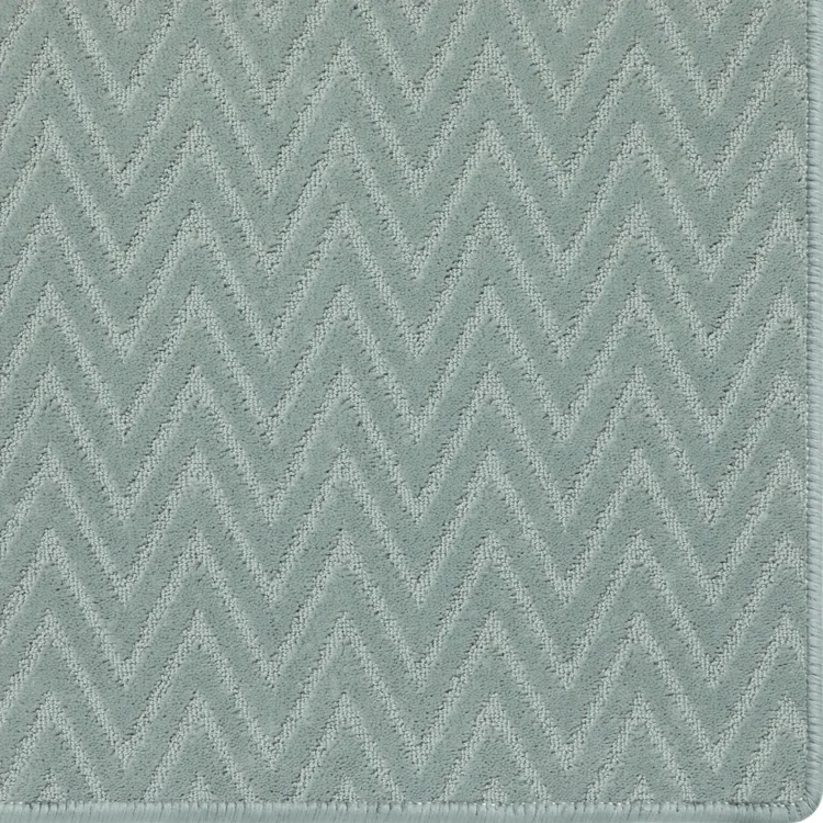 custom size blue metal colour rug with chevron pattern and overlocked edges