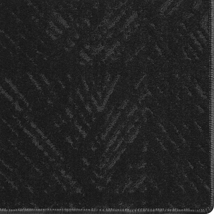 Charcoal carpet rug with scale pattern and overlocked edges