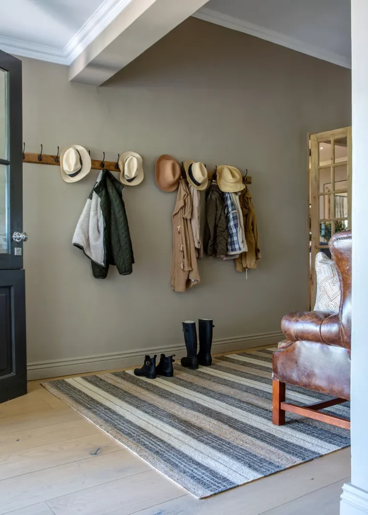 Striped rug on floor with chair