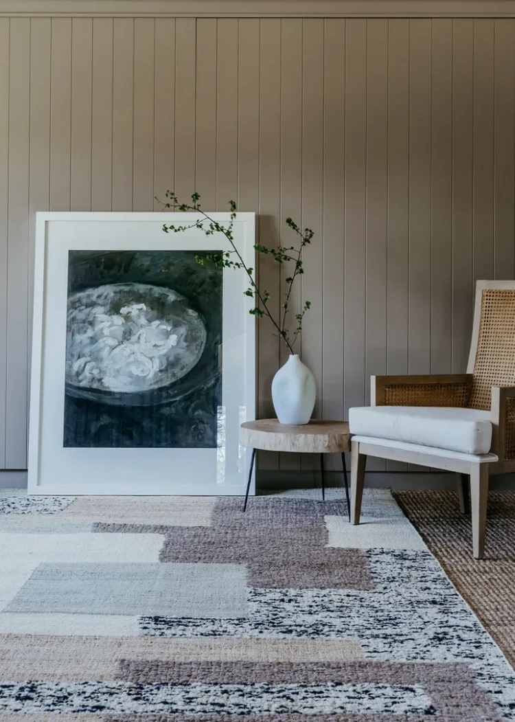 picture and chair on navajo rug