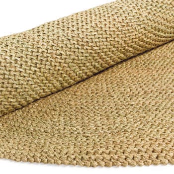Elevate your home with the Round Crochet Luthindzi Rug, a masterpiece of sustainable artistry handwoven from 100% natural Luthindzi grass. Crafted by skilled artisans in Eswatini, this circular rug brings organic elegance to any space. Available in three sizes (2m, 2.5m, and 3m), its versatile design complements diverse interior styles from bohemian to minimalist. Each unique piece celebrates traditional weaving techniques while empowering local female artisans through fair trade practices. The lightweight, durable rug features an intricate crochet weave that adds warmth and texture to living rooms, dining areas, bedrooms, and covered patios. Beyond its aesthetic appeal, this rug represents a commitment to sustainable living, cultural preservation, and ethical craftsmanship. Easy to maintain and naturally breathable, it's more than a floor covering—it's a statement of beauty and social responsibility.
